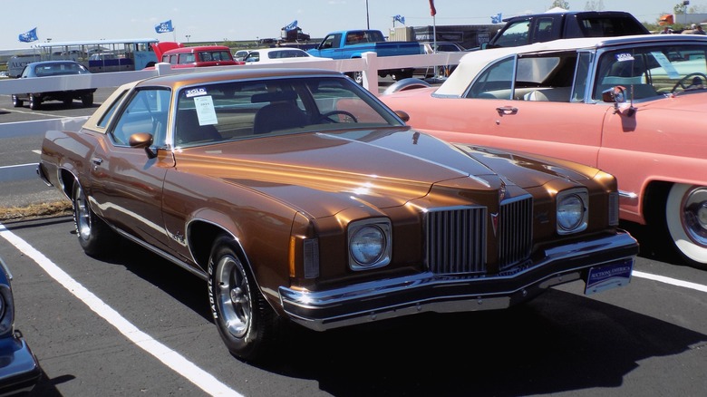 Bronze 1974 Pontiac Grand Prix parked