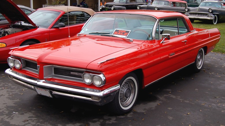 Red 1962 Pontiac Grand Prix parked for sale