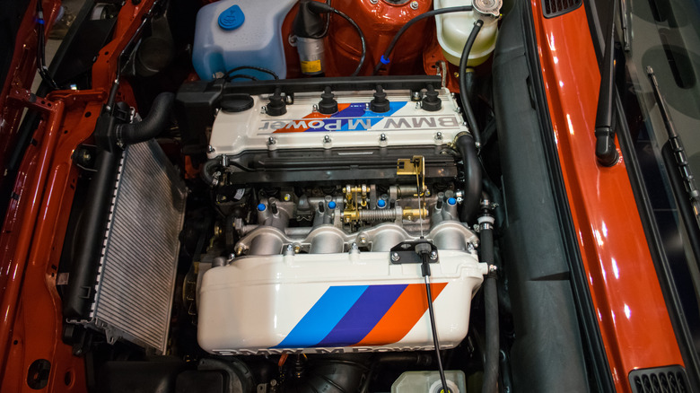 A closeup of the BMW E30 engine