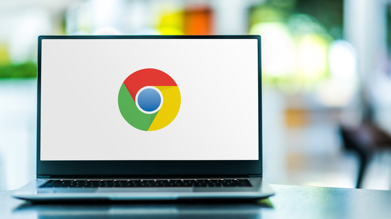 open laptop featuring Google Chrome's logo