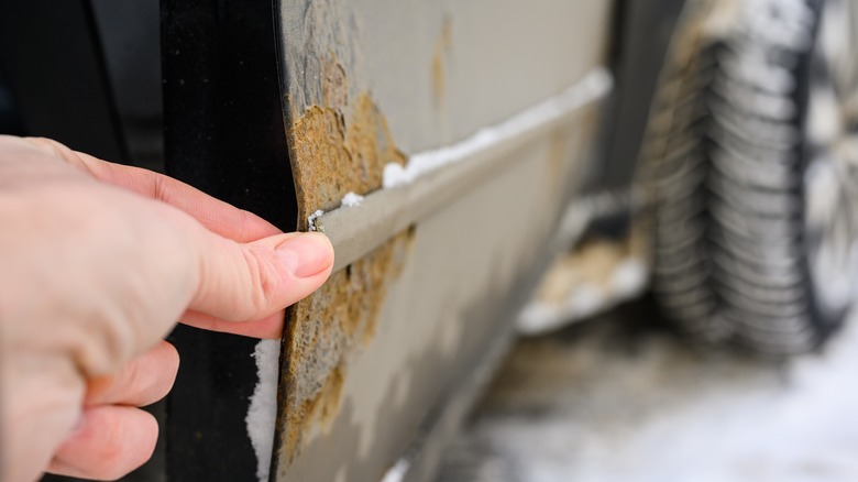 Rust damage on car from winter driving