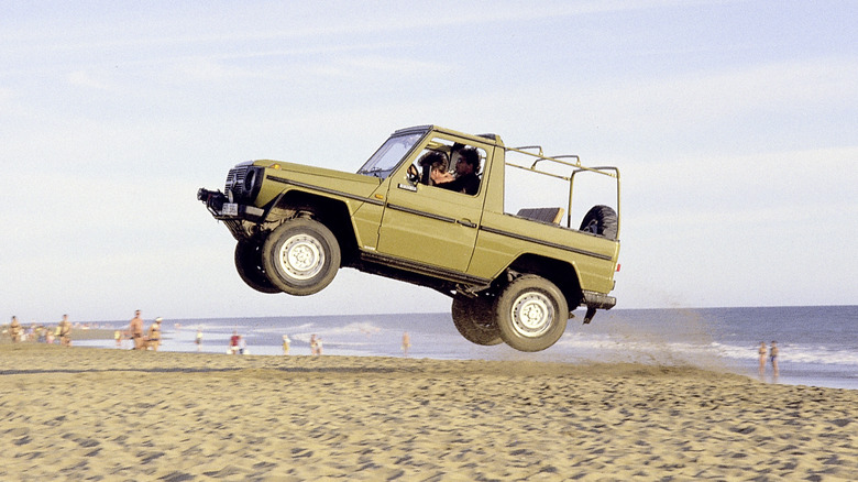 Classic G-Wagon jumps across a beach