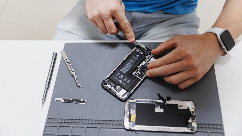 opened iPhone under repair