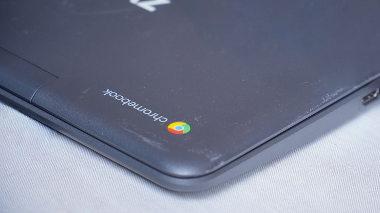 Corner of a scuffed-up Chromebook