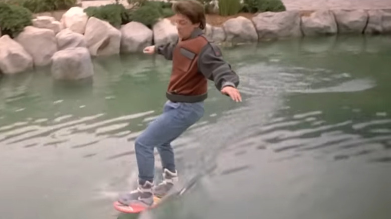 Marty McFly hoverboarding over water