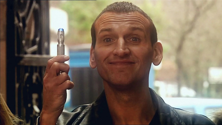 The Doctor holding sonic screwdriver