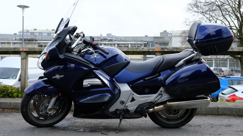 blue honda St1300 parked