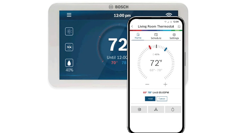 A Bosch thermostat behind a smartphone