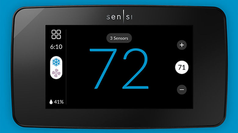 A Sensi Touch 2 Thermostat on a blue background