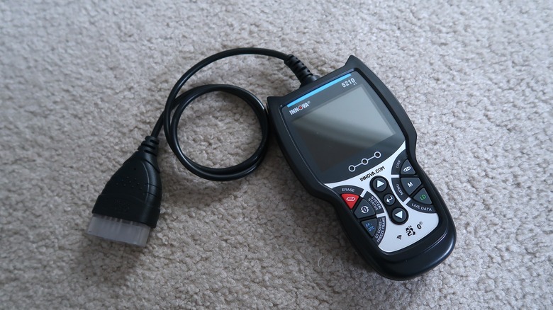 diagnostic scanner on carpet