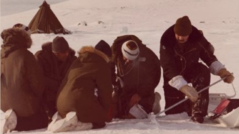 Operation Morning Light crew digging in radioactive snow