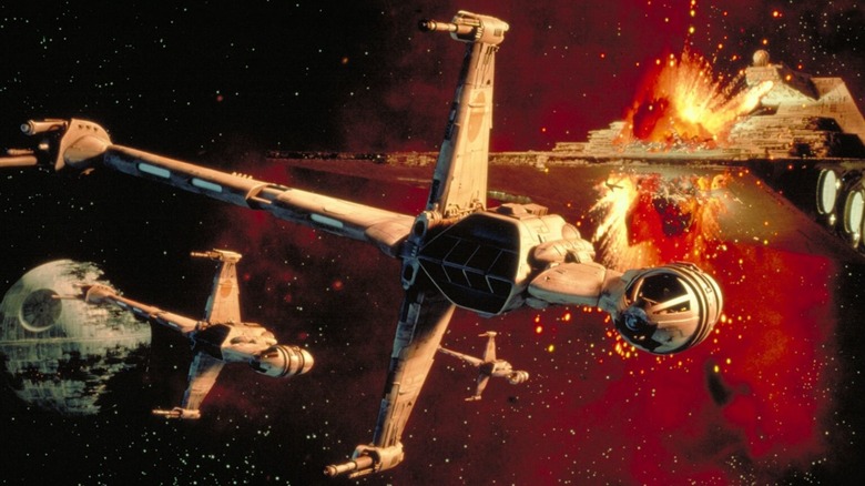 B-Wing fighters flying through space