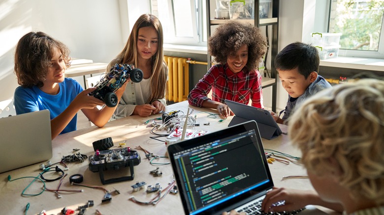 Kids playing with tech