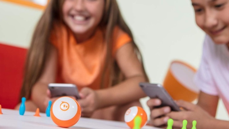 Two kids playing with Sphero Mini