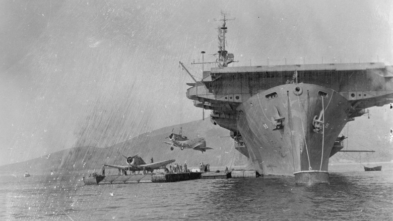 Douglas SBD Dauntless loaded onto USS Bismarck Sea