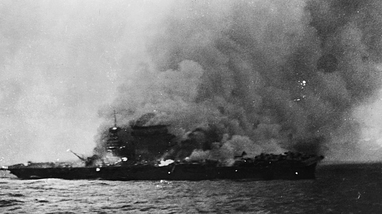 Burning of USS Lexington following Battle of Coral Sea, May 8, 1942.