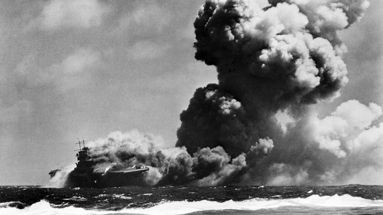 The USS Wasp burning after she was struck by three torpedoes from a Japanese submarine.