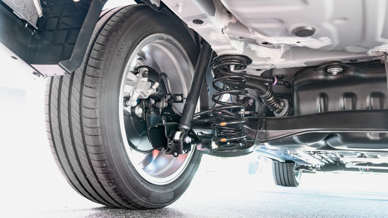 The underside of a car's rear suspension showing shock absorbers