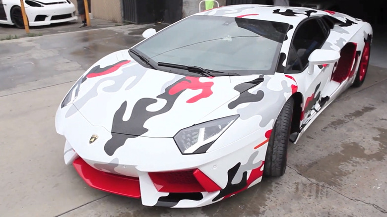 Chris Brown's Aventador leaves the shop