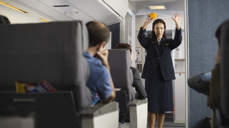 Flight attendant safety demonstration