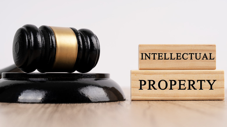 Blocks spell the words Intellectual Property next to a gavel