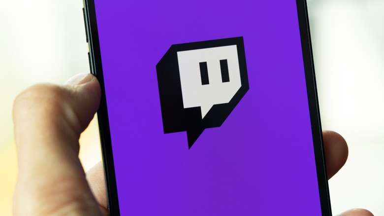 Twitch logo on iPhone screen