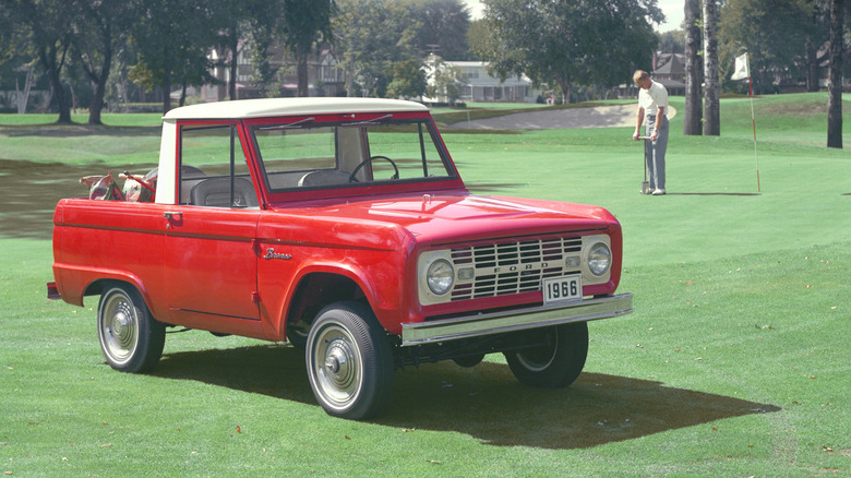 Ford Bronco 1966 parked on golf course