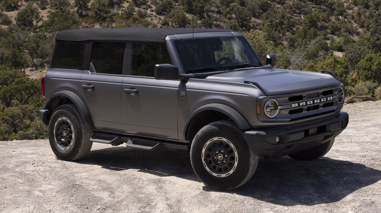 Ford Bronco with Matter Clear Film parked on gravel in front of scrub brush