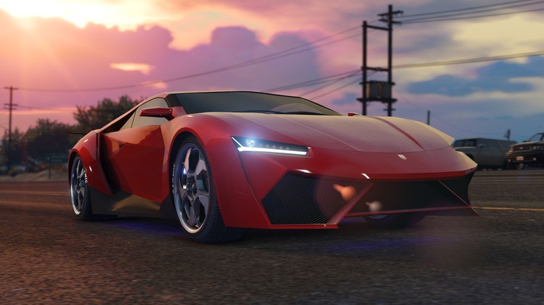 grand theft auto online red sports car sunset