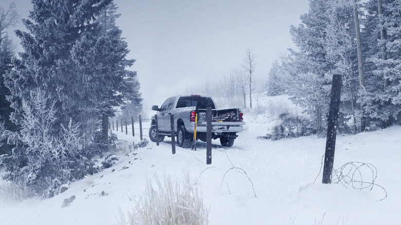 Pickup truck hauling gear in the snow