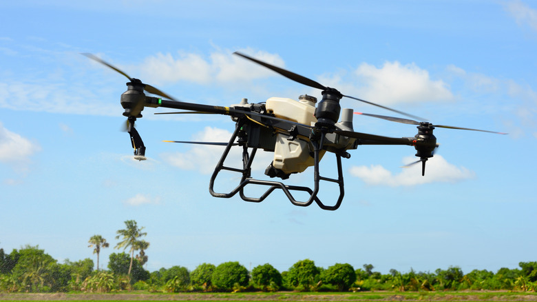 Drone flying over a field