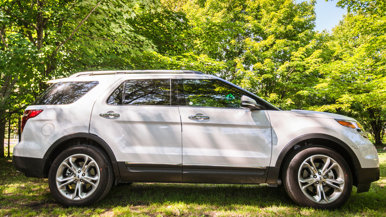 Ford Explorer by maple trees