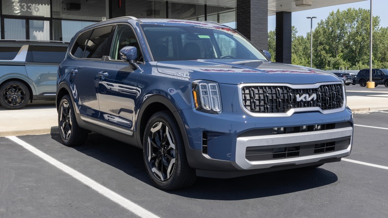 Blue Kia Telluride at dealership