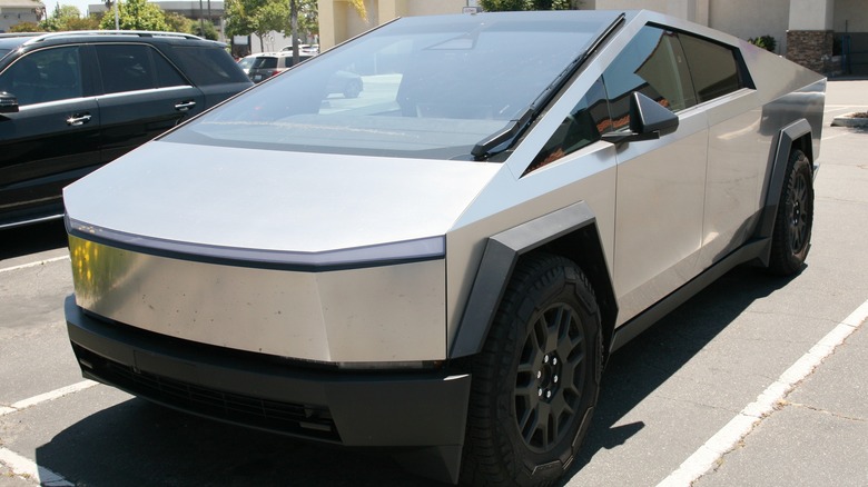 A Cybertruck in a parking lot