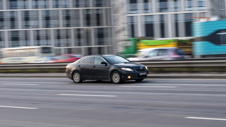 Toyota Camry speeding down street