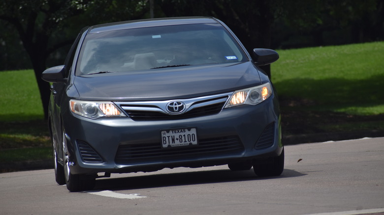 Toyota Camry near nature reserve