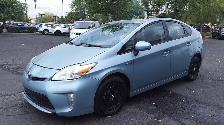 A blue Toyota Prius Two in a parking lot