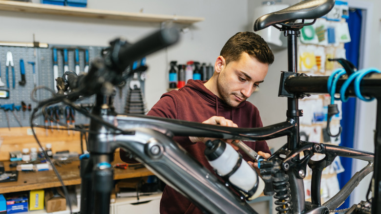 Man working on eBike