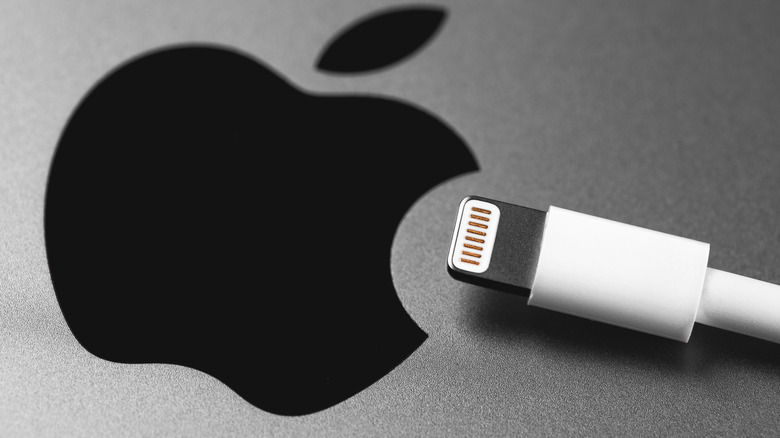 Lightning cable and Apple logo on Apple device