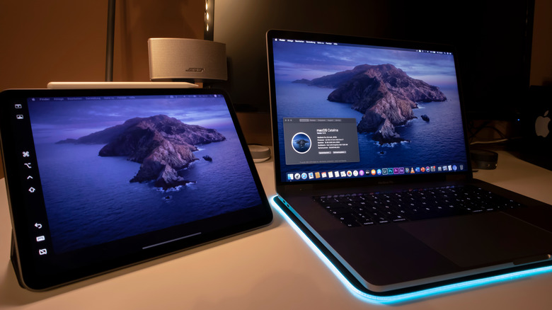 iPad and Macbook side by side showing same displays