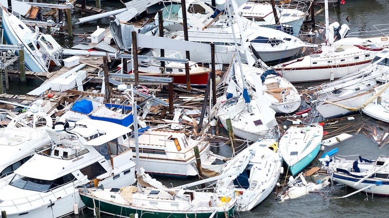 Damaged boats in harbor