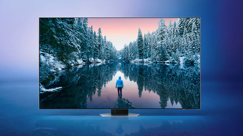 A Samsung TV against a blue, pink, and purple background