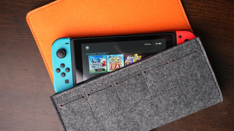 Nintendo Switch peeking out of case