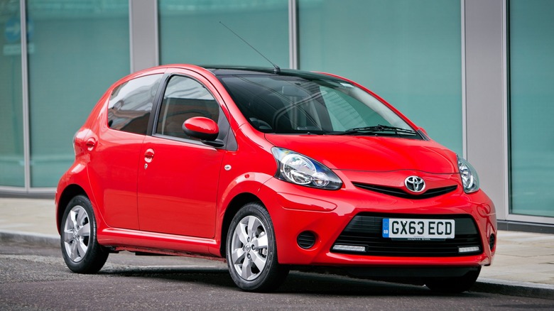 The first generation Toyota Aygo in red, front 3/4 view