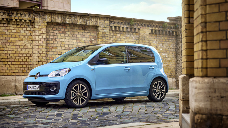 The Volkswagen Up in blue, front 3/4 view