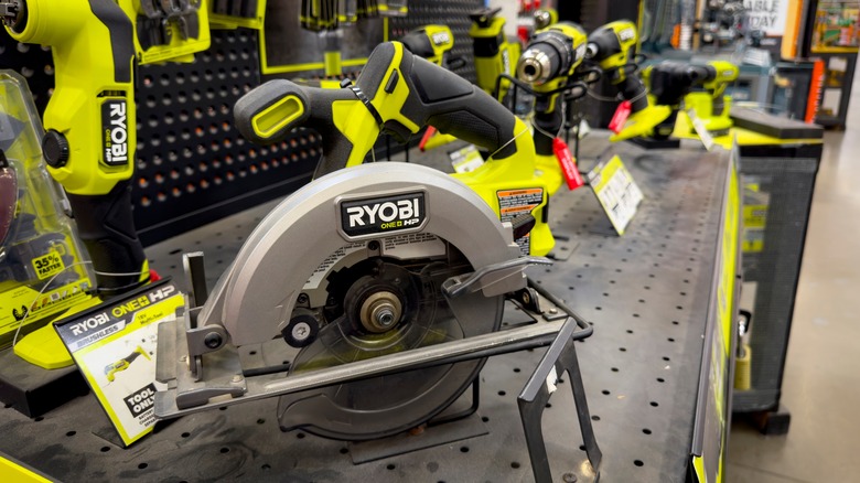 A shelf full of Ryobi tools at a Home Depot