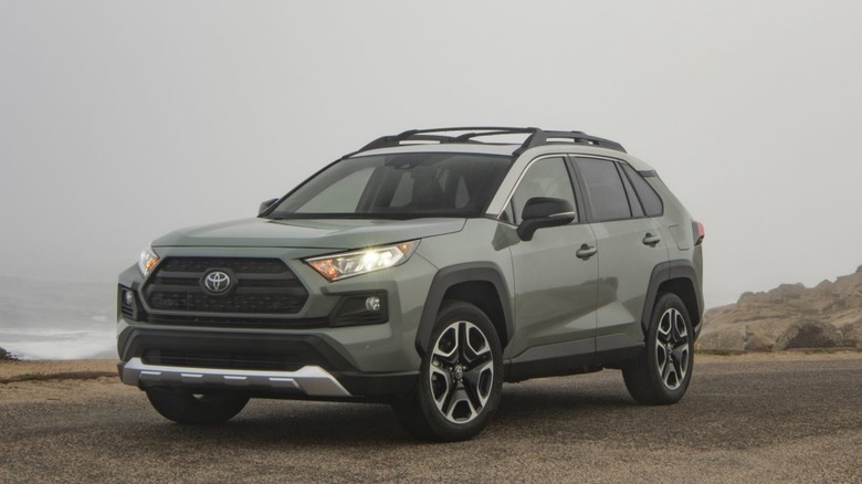 Toyota RAV4 on road in front of ocean