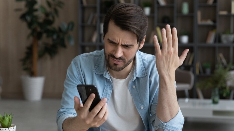 Angry man with an iPhone