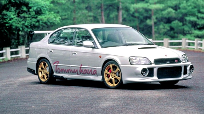 Subaru Legacy B4 RSK white with gold wheels