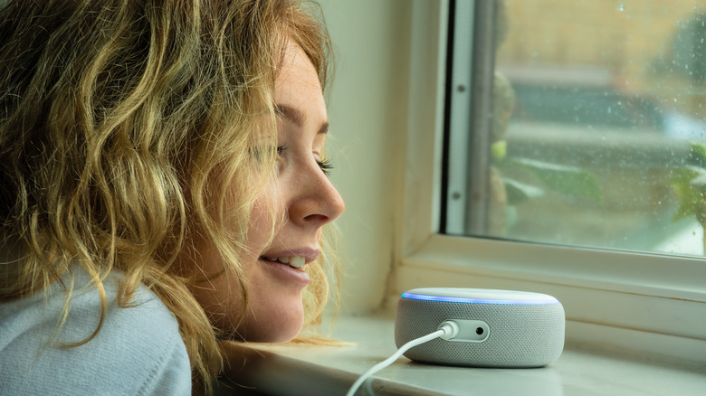 girl talking to an Echo Dot